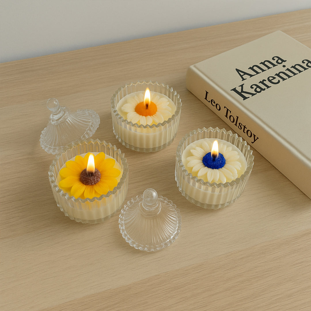 Royal Daisy scented candle combo - Lifestyle Image of Royal Daisy scented candle combo with a book