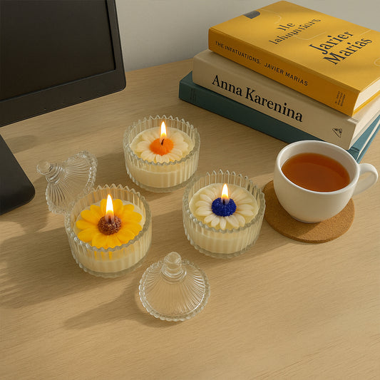 Royal Daisy scented candle combo - Lifestyle Image of Royal Daisy scented candle combo on a table with books 